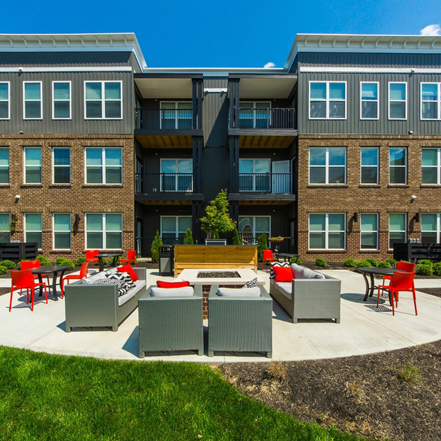 Stafford House - Outdoor Lounge with Tables and Firepit