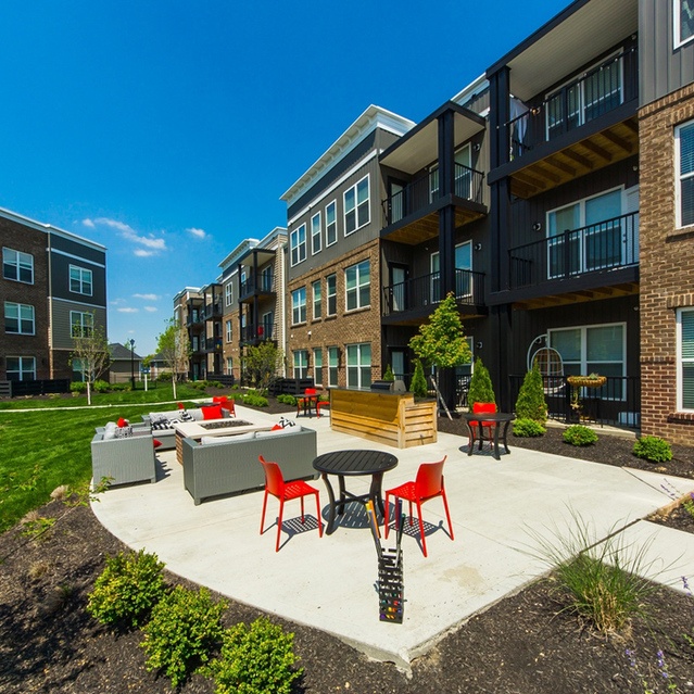 Stafford House - Outdoor Lounge with Tables and Firepit